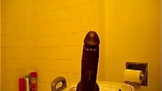 Horny black girl rides huge dildo - porn video