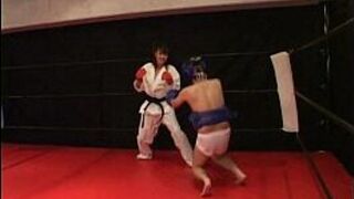 Mistress is serious in beating up a slave in a sparring match - porn video